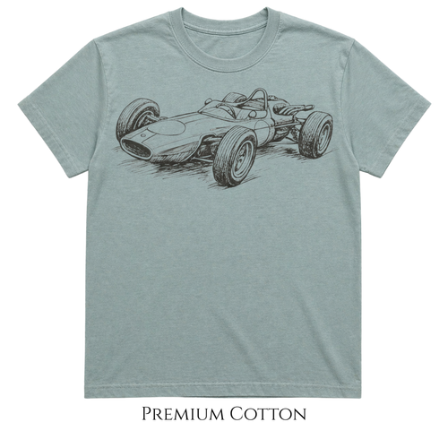 Bay colored t-shirt with a vintage race car graphic on a white background