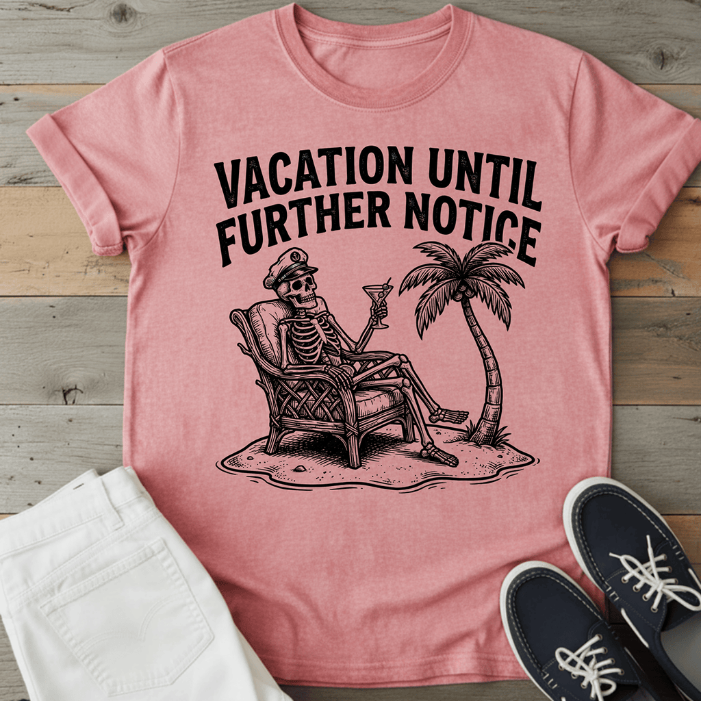 Retro Beach Skeleton T-Shirt in pink with a skeleton relaxing under a palm tree and text "VACATION UNTIL FURTHER NOTICE.